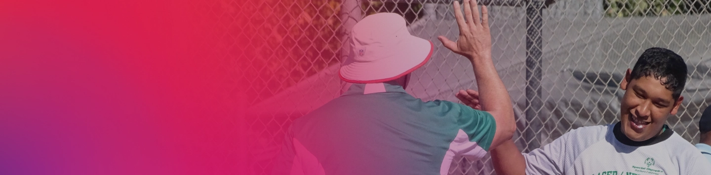 Coach giving high-five athlete