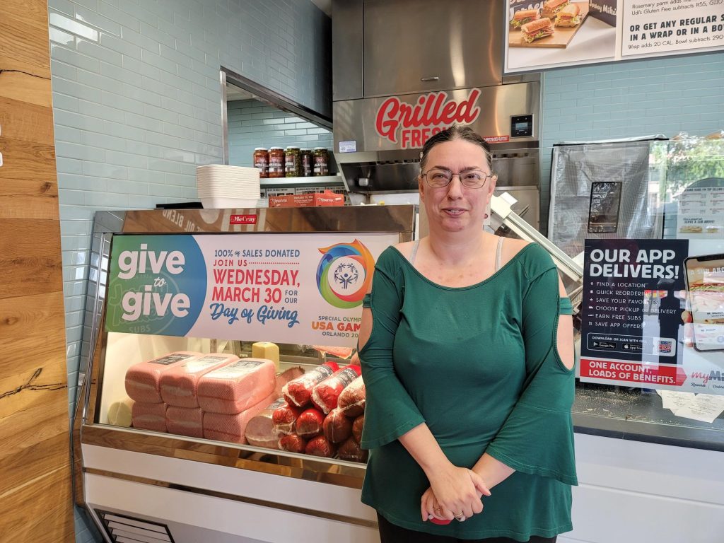 Jersey Mikes - SONorCal in front of "Day of Giving" signage