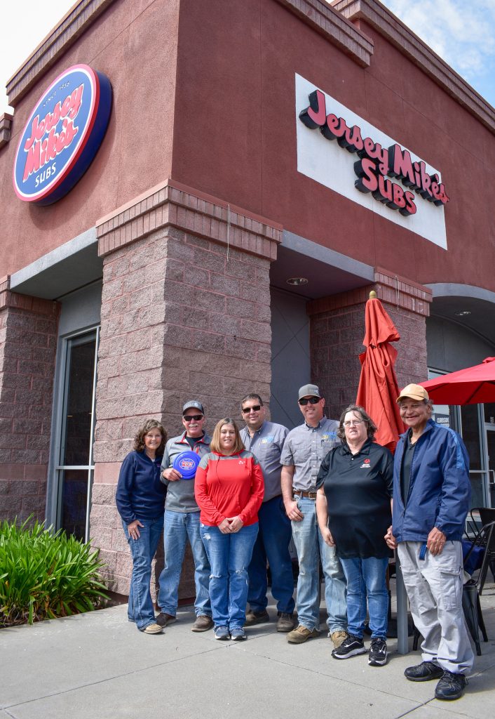 Jersey Mikes - People outside in front of Jersey Mike's store