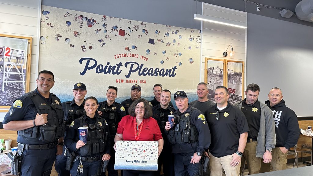 Jersey Mikes - Law enforcement officers and athlete in Jersey Mike's store
