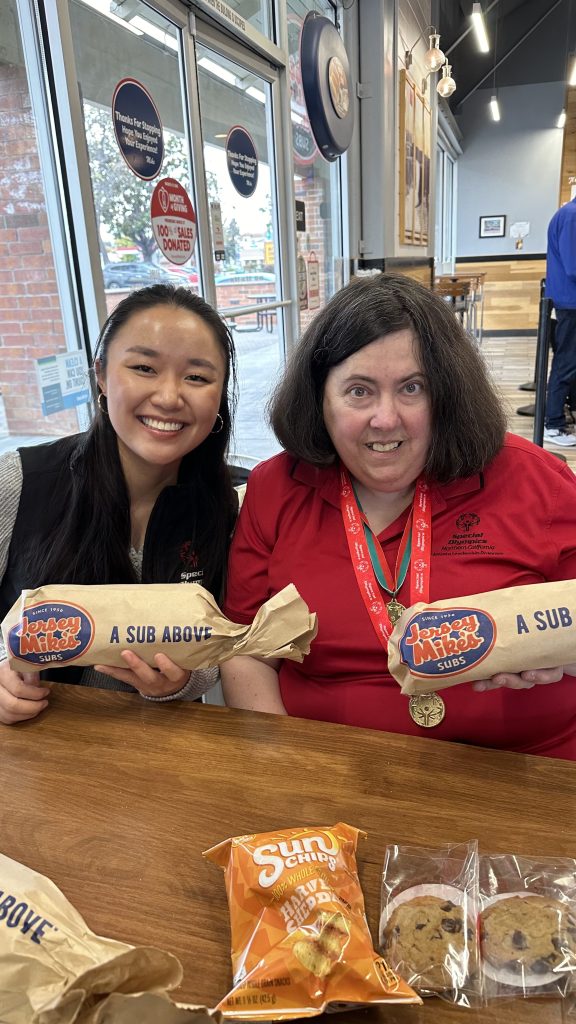 Jersey Mikes - Two women holding subs