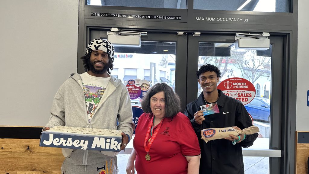 Jersey Mikes - Santa Clara University and athlete holding sandwiches