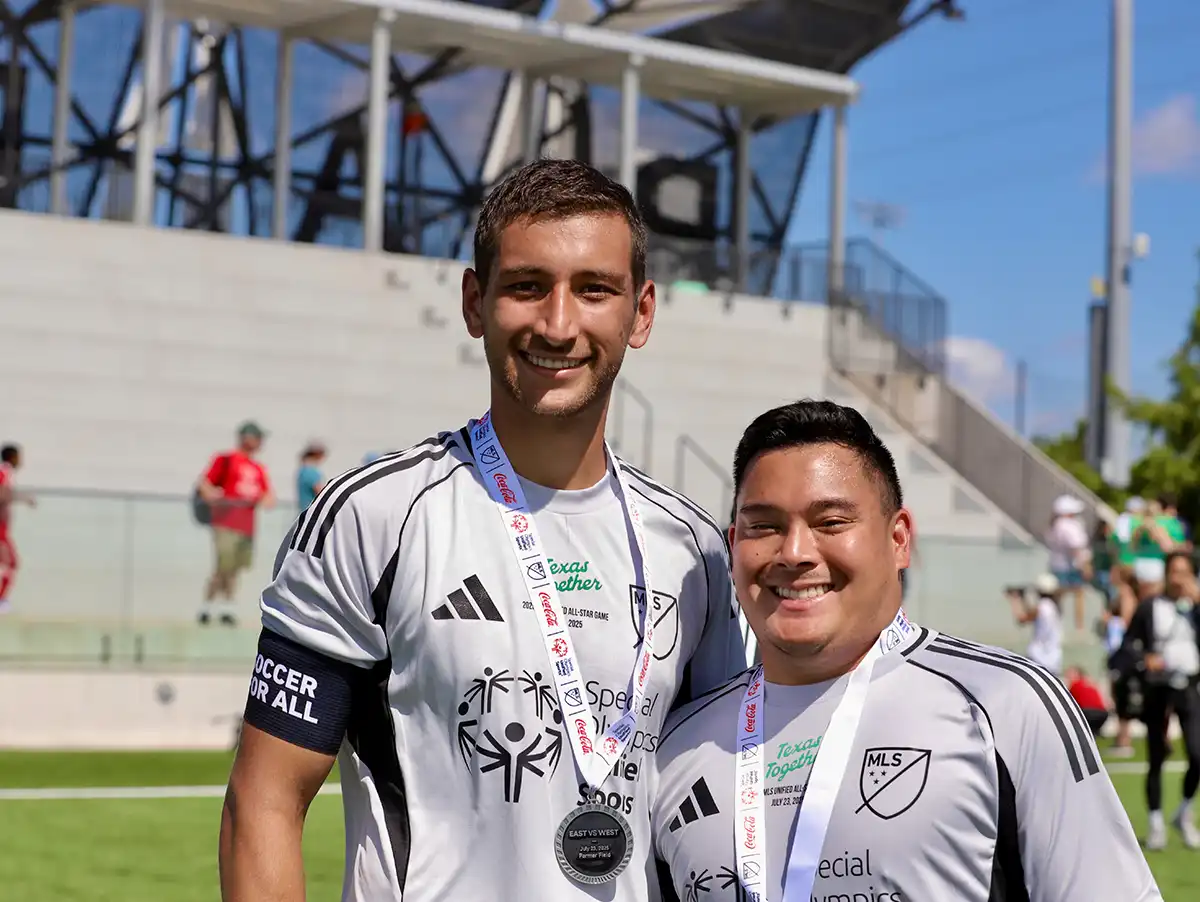 Unified Pair Competes In MLS Unified All-Star Game - Men Wearing Medals