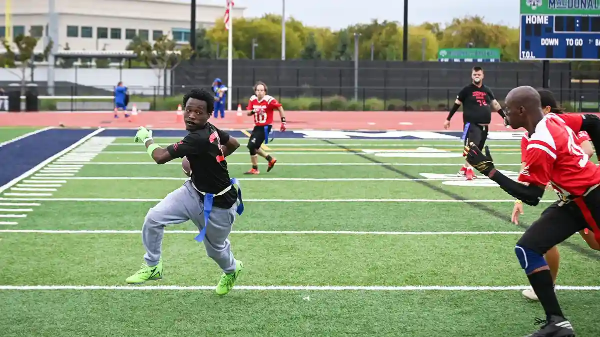 Blog - Discovery All Stars Unified Flag Football Team on the Road to Minnesota - Running Play