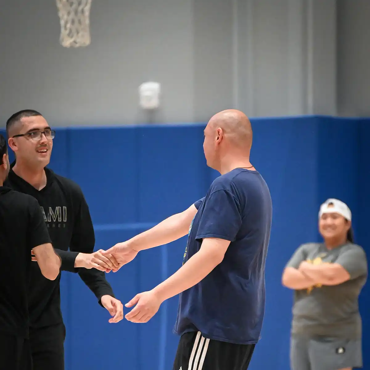Blog - Special Olympics NorCal basketball team heads to USA Games - Hand Shake