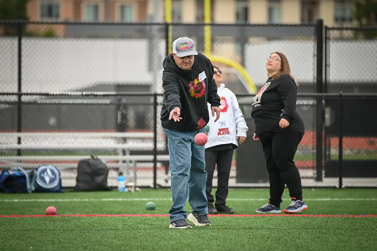 Team NorCal Bocce Enjoys USA Games - Male with Red Ball