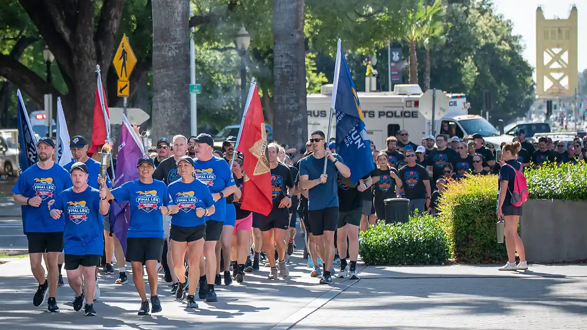 Torch Run Celebration Marks Beginning of USA Games Experience